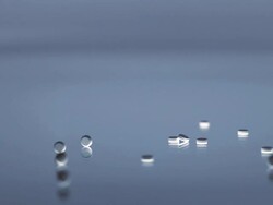 HD SUPER SLOW-MO: Pills Rolling On A Glass Stock Footage