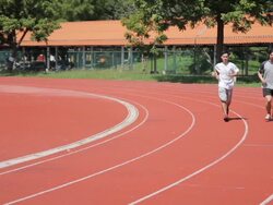 Couple running in sport track Stock Footage