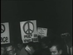 Protesters carry signs during an anti-war demonstration. News Clip