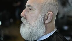 brutal barber clipper mows bearded adult senior hipster Stock Footage