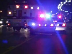 Ambulance and police car Stock Footage