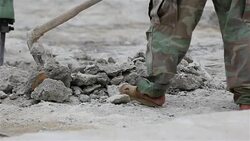 Close up Worker man drilling cement concrete road for put the plumbing Stock Footage