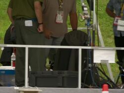 MS PAN Shot of television news crews working outside during G8 meeting / Hokkaido Toyako, Japan Stock Footage