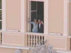 Princess Charlene and HSH Prince Albert II of Monaco wave and kiss at the Monaco Royal Wedding: First Appearance of Married Couple at Monaco . (Footage by WireImage Video/Getty Images Entertainment Video) Stock Footage