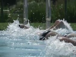 CU TS SLO MO Shot of Swimmers in lanes, turning at wall / Davis, California, United States  Stock Footage