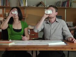 MS PAN Young architects working on and discussing building plans / Portland, Oregon, USA Stock Footage