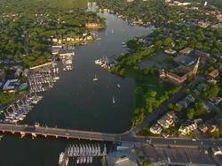 MS AERIAL Shot of boats and waterfront homes on Spa Creek inlet of Chesapeake Bay / Annapolis, Maryland, United States Stock Footage