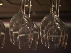 Wine Glasses hanging Above Bar News Clip
