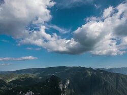 Time-lapse of clouds in the mountains Stock Footage