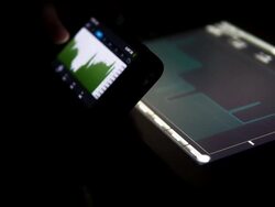 Looking At Mobile Phone Showing Graph Stock Footage
