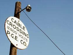 MS Shot of Cable crossing 12,500 volts warning sign / Portland, Oregon, United States  Stock Footage