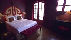 A lamp glows on a desk in a hotel room at the La Maison Hotel in Rio de Janeiro. Stock Footage