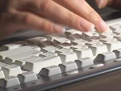 Typing on a computer keyboard Stock Footage