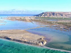 AERIAL ZI WS PAN View of dead sea salt formations / Sourn Judea Desert, Israel  Stock Footage