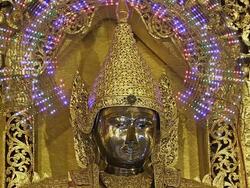 CU Shot of Face of golden Buddha statue / Yangon, Yangon Division, Myanmar  Stock Footage