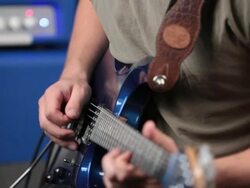 Man playing an Electric guitar Stock Footage