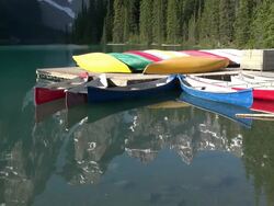 MS View of boats at Moraine lake in Banff National Park ( Valley of ten peaks ) / Lake Louise, Alberta, Canada Stock Footage