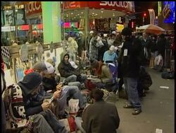 Nintendo's latest gaming console, the Wii, went on sale in New York City sunday morning.  Fans lined up outside of Toys R' Us in Times Square for days to be among the first to get their hands on a Wii. News Clip