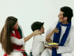 Family playing holi with colors  Stock Footage