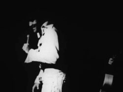 Elvis Presley sings before a live audience in Las Vegas Stock Footage