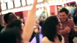 Friends cheer and dance to live music in downtown Las Vegas Stock Footage