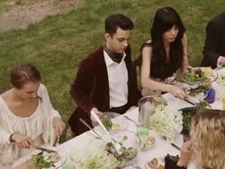 Friends and family eating at an outdoor dinner party Stock Footage