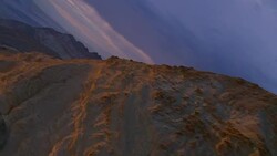 Death Valley Desert Aerial on the side of Eastern Mountains Stock Footage