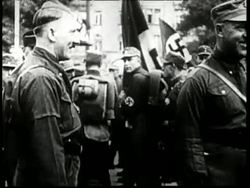Adolf Hitler becomes the leader for the rising Nazi movement in Germany. News Clip