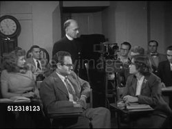 1953: GEORGETOWN UNIVERSITY: WS Heyden Observatory (biology lab since 1970s). Director Father Francis J. Heyden (1907-1991) showing slide of Mars to grad students, SOT asking for lights down, few Mars facts, lights up, leaving for observatory. Instructional Video