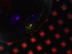 HD Disco ball in front of ceiling lights (loopable) Stock Footage