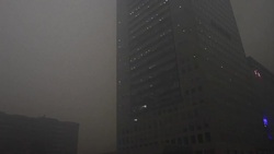CLEAN : Beijing cloaked in heavy smog as schools factories ordered shut News Clip