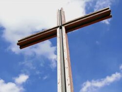 HD Christ Cross against sky (pan & time lapse) Stock Footage
