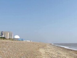 WS PAN Sizewell nuclear power station onto beach and sea / Sizewell, Suffolk, United Kingdom   Stock Footage
