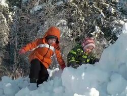 children play in snow Stock Footage