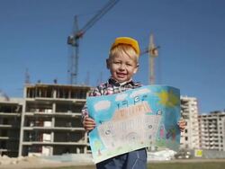 boy with children's drawings Stock Footage