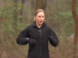 Pam Running Toward 1 - Panning Stock Footage