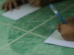 Children hand writing Stock Footage