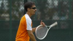 Tennis player practicing his return stance. - Slow Motion Stock Footage