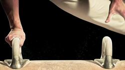 SLO MO Hand gripping in double leg circle routine Stock Footage