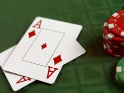 HD SLOW MOTION: Pair Of Aces Falling On A Table Stock Footage
