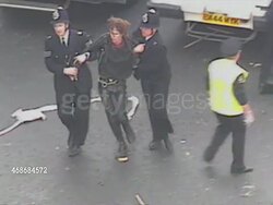 Police Leading Away Anti-Poll Tax Protester News Clip