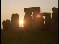 T/L Dusk Sun and Stonehenge - sun goes down between stones Stock Footage