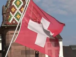 Swiss flag flying Stock Footage