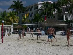 Cancun resort people play volleyball Stock Footage