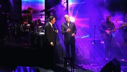 Haiti's singer-turned-president joins Julio Iglesias at charity concert Instructional Video