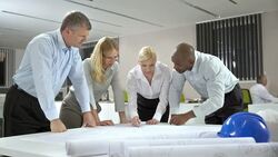 DS MS Team Of Architects Studying Blueprints Stock Footage