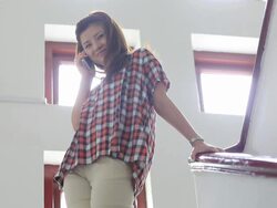 Young woman talking on a smartphone Stock Footage