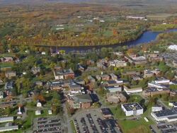 WS ARIEAL View of University of Maine campus in front of river / Maine, United States Stock Footage