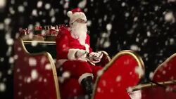 DOLLY HD: Father Christmas in the Sleigh with Snow Stock Footage