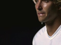 SLO MO, CU, TU, Exhausted tennis player holding racket, night, Santa Barbara, California, USA Stock Footage